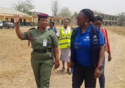 Dr Onyibe (right) leading other personnel on contact tracing.jpg